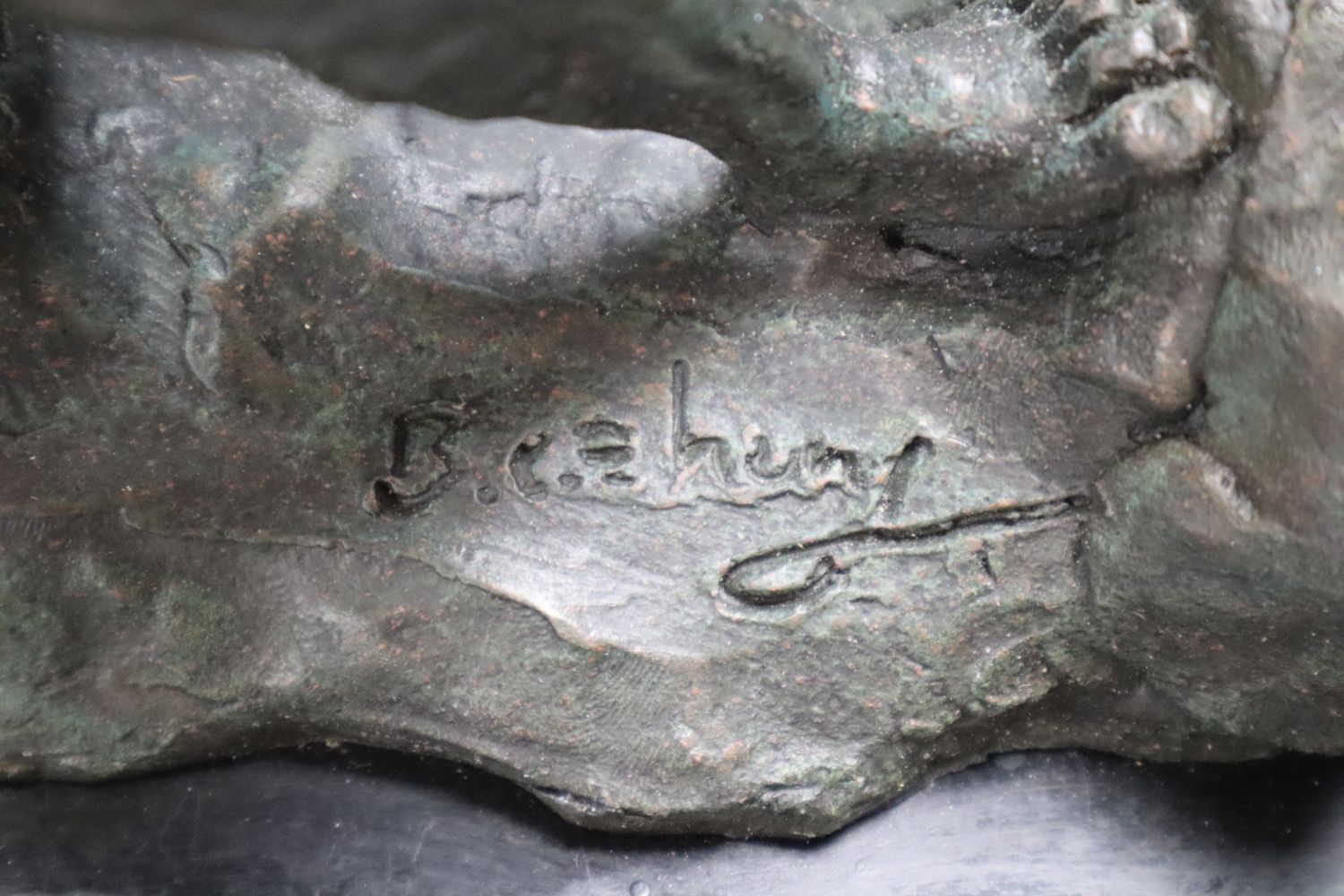 A bronze of a nude male, on marble base, indistinctly signed, height 36cm